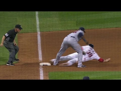 MIN@CLE: Rosario nabs runner after call overturned