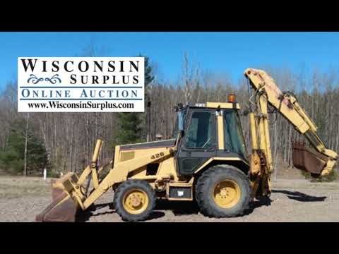 Wisconsin Surplus Online Auction - 1990 Caterpillar 426 Tractor Loader Backhoe