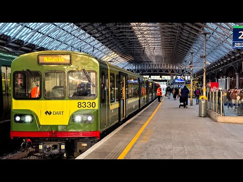 RARE 4 Carriage 8100/8300 class Dart Train (8330/8112) departs Pearse for Greystones.