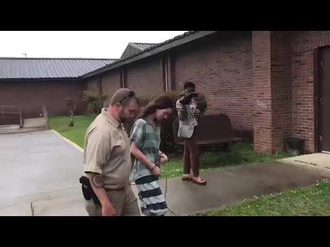 Denise Frazier perp-walk into court