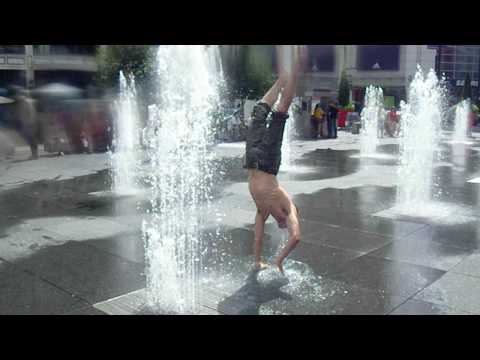 Handstand walk through fountains in Dundas Square IMGP2291