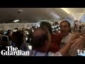 World Cup highs: Argentina fans on flight to Buenos Aires revel in final triumph