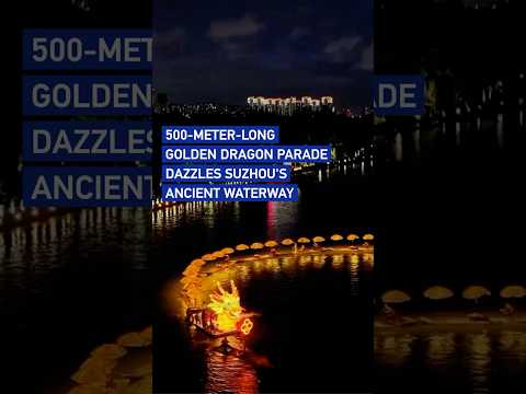 500-meter-long golden dragon parade dazzles Suzhou's ancient waterway