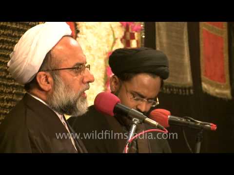 High priest speaks to shia devotees in farsi explaining them about Muharram