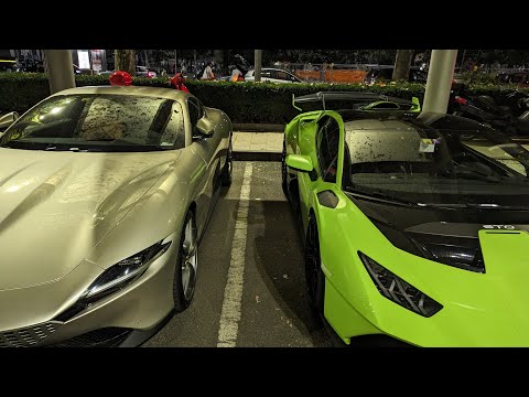 Ferrari and Lamborghini at home in Italy with Swiss license plates.