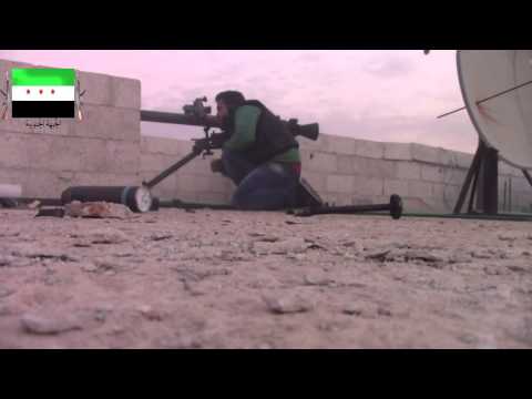 استهداف تمركز أحد قناصي النظام بقذيفة اس بي جي 9 من قبل لواء معاذ بن جبل في ريف درعا ضمن معركة ادخلوا عليهم الباب