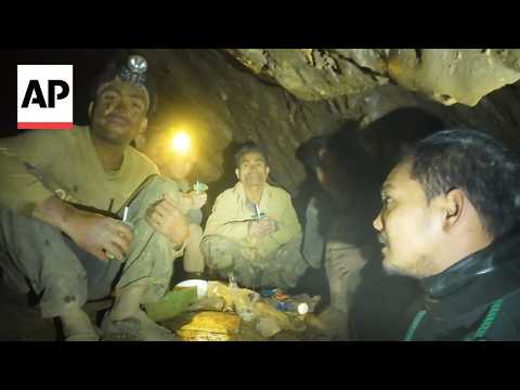 Rescue divers in Laos safely evacuate first of 5 local villagers trapped in cave by floodwaters
