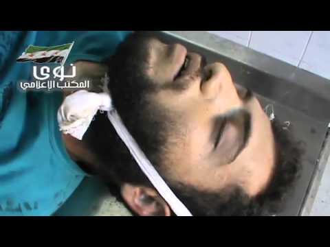 جثمان المنشق عبد الرزاق جنيد أحد عناصر لواء الحرمين الشريفين في ريف درعا