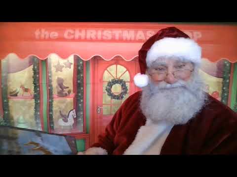 Santa Claus reads The Night Before Christmas.