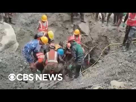 2 men rescued from Nepal tunnel 9 days after catastrophic floods