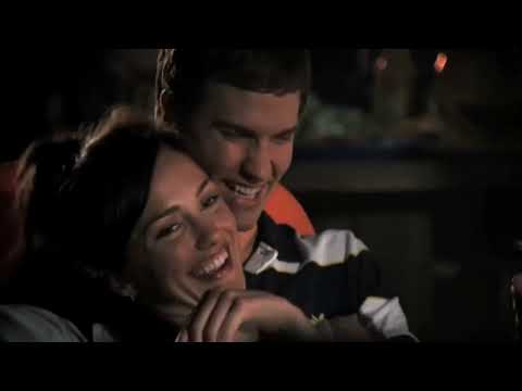 Friday Night Lights TV series Emmy trailer thumbnail featuring Coach Taylor and team under stadium lights