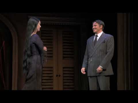 The Addams Family Broadway musical trailer still with the full Addams clan onstage