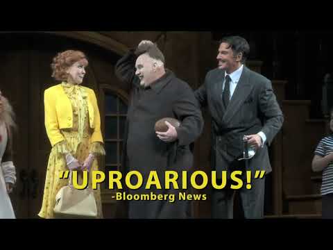 Close-up of Gomez and Morticia in The Addams Family musical trailer performing a tango