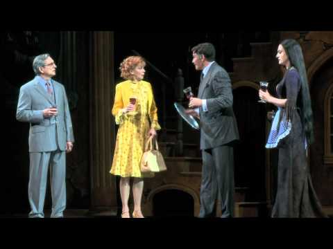 Stage view of The Addams Family musical cast bowing in the Broadway trailer