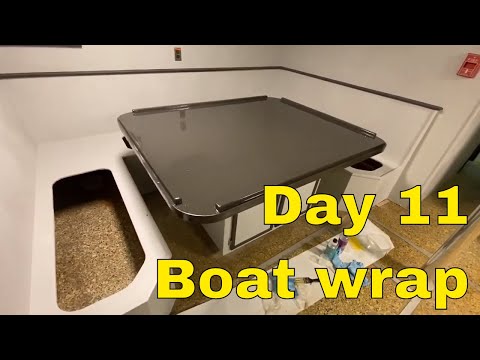 Working on wrapping a work boat using the Architectural Films - Day 11  in Louisiana