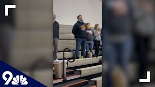 WOW! Dad sings impromptu National Anthem at high school basketball game after sound system fails