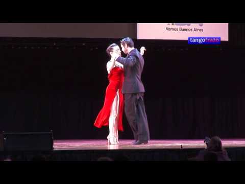  Giovanna Di Vincenzo  and  Sergio Almirón  are  dancing  to  the  tango  "  Pa'Que Te Oigan Bandoneon  "  in  2016