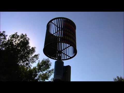 spinning Squirrel cage fan windmill spins in 3 M.P.R. wind