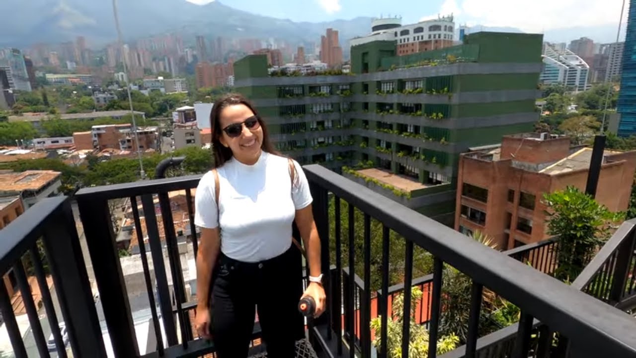 Immersive street-level walking tour through Medellín — El Poblado, Colombia, showcasing authentic urban landscapes, local architecture, and the vibrant atmosphere of the city's neighborhoods