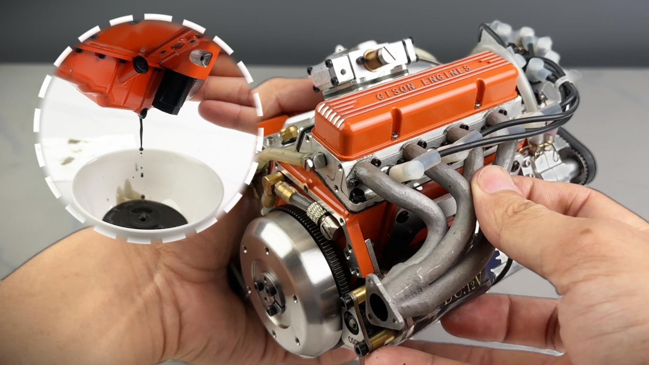 How do I change the oil in a 1/6 small-block engine model?