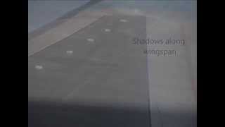 preview picture of video 'Shockwave shadows on Boeing 757-200 wing'