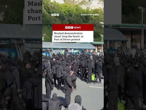 Masked demonstrators chant 'stop the boats' at Port of Dover protest. #England #BBCNews