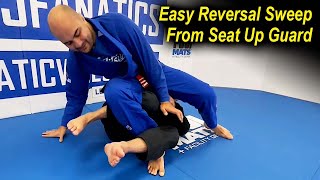 An Easy Reversal Sweep From The Seat Up Guard by Thomas Rozdzynski