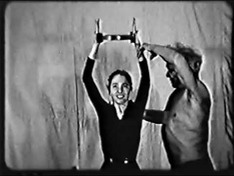 Joseph Pilates teaching Eve Gentry in 1956.