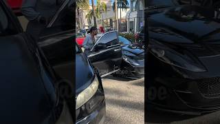 Woman swings door open damages Luxury Ferrari in front of Louis Vuitton