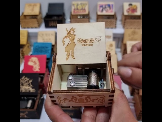 Vídeo relacionado con Cuzit Caja Musical de Madera con diseño de Pelota de DBZ, diseño Antiguo