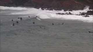 Winter surfing in Manorbier Bay, Pembrokeshire, Wales