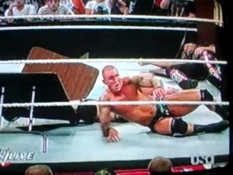 randy orton reverses a fu through a table