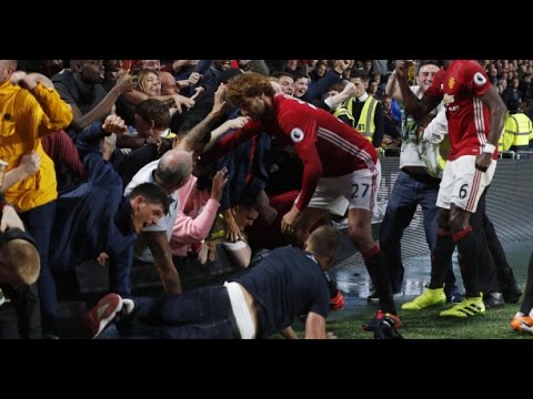 Marouane Fellaini rushes to help woman crushed during Manchester United's victory goal!!!