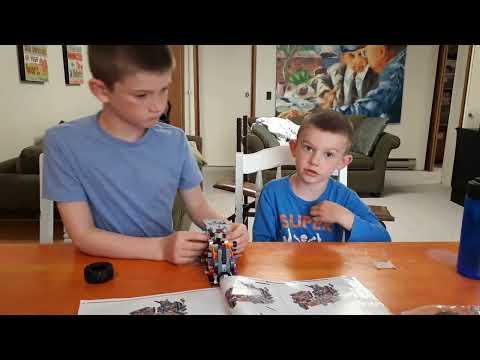 Isaiah and Samuel building Lego technic set 42139 part 4