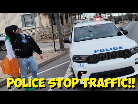 RIVALS MEET IN THE MIDDLE OF THE STREET 