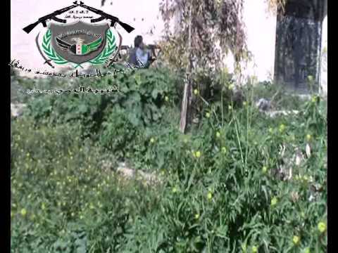 تأمين كتيبة الحسن الحماية للمدنيين أثناء محاولتهم تفريغ مستودع للطحين في بلدة عقربا في ريف دمشق