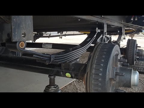Replacing Leaf Springs, Shackles, and Bushings on a Travel Trailer Plus Greasing Wheel Bearings.