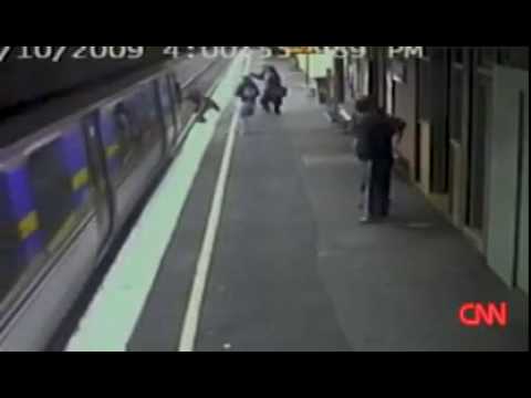 Baby narrowly survives being run over by a Train!!! A must see!!
