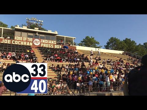 Friends and family hold vigil for basketball star Caleb White