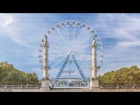 Ferris wheel at Place des Quinconces timelapse in Bordeaux, France.