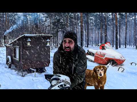 Escaping a WINTER STORM in our Snowmobile Cabin!