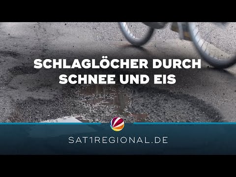 Schlaglöcher durch Schnee und Eis behindern Hamburgs Verkehr
