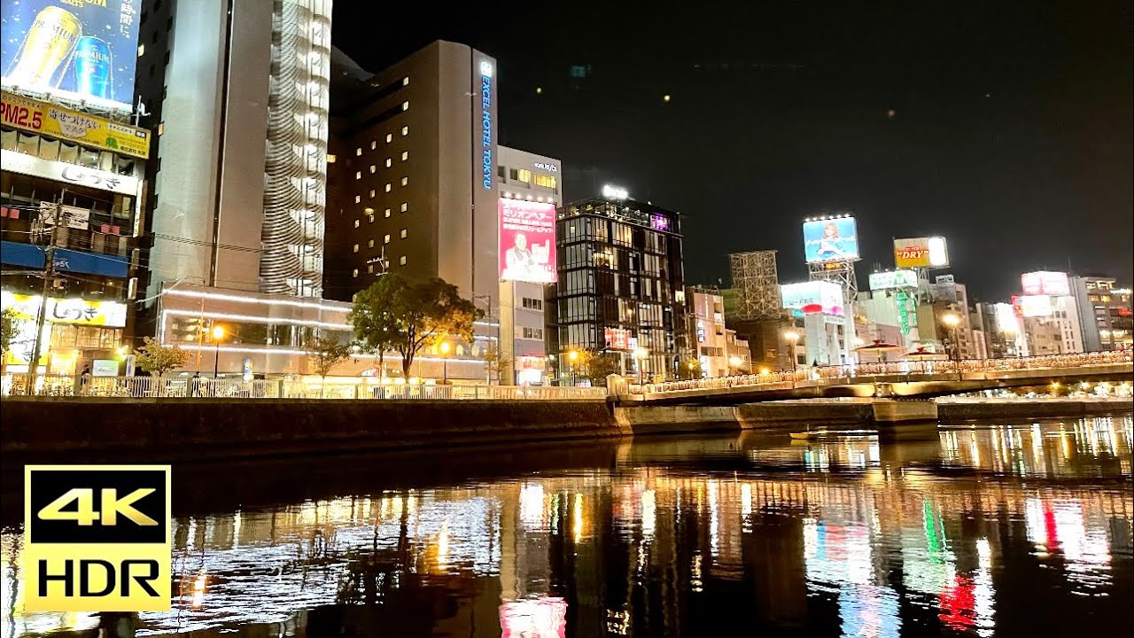 Immerse yourself in breathtaking city views aboard the Naka River Cruise at night.