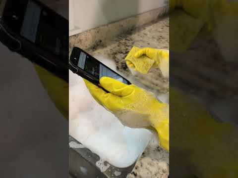 Jennifer scrubbing away on CAT phone