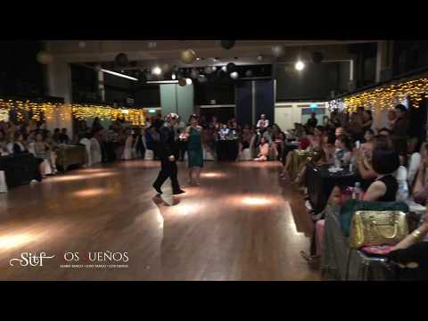  Lily Cheng  and  Raymond Chu  are  dancing  to  the  tango  "  Independencia  "  by  Juan D'Arienzo  at  Singapore International Tango Festival  in  2018