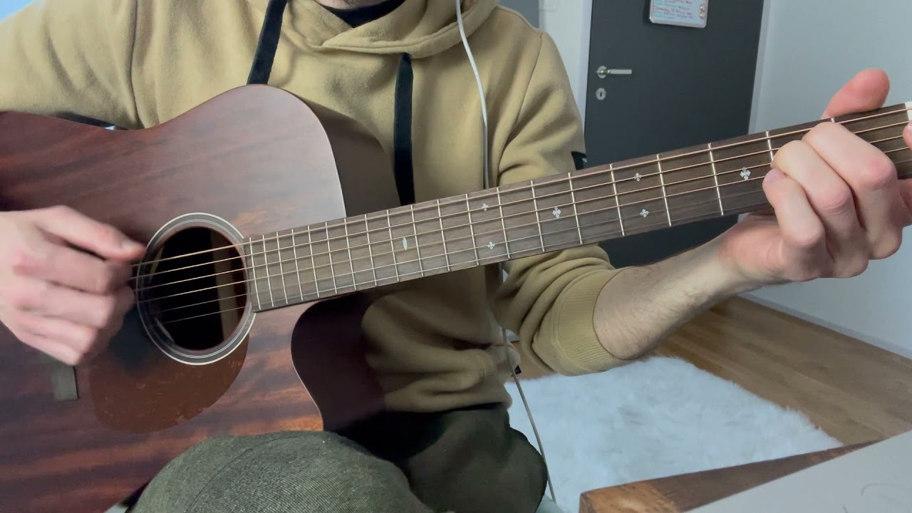 Roberto Barlocci playing a fingerstyle Nights in White Satin arrangement on solo guitar