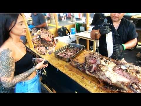 Street Food in Barcelona, Spain. Asado of Black Angus Beef. Meat&Fire Fest