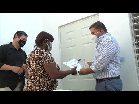 Ministry of Housing Hands Over Home to Belize City Woman