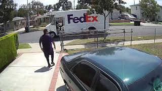 FedEx Driver drops box
