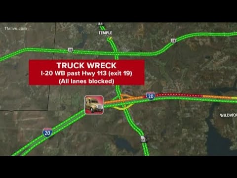 Truck wreck shuts down all lanes